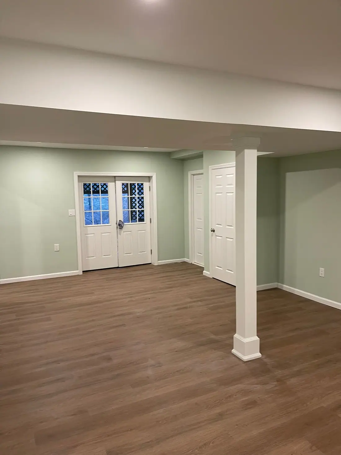Wrapped support post and plank floor