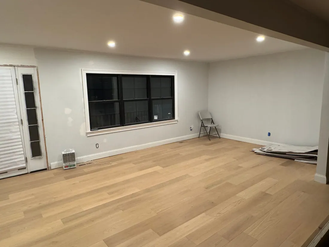 Living room on new wide-plank hardwood