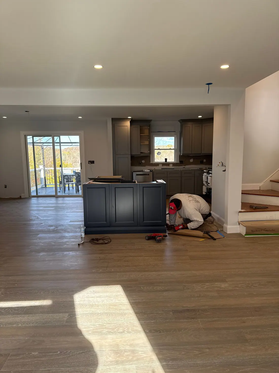 Navy island on new hardwood floors