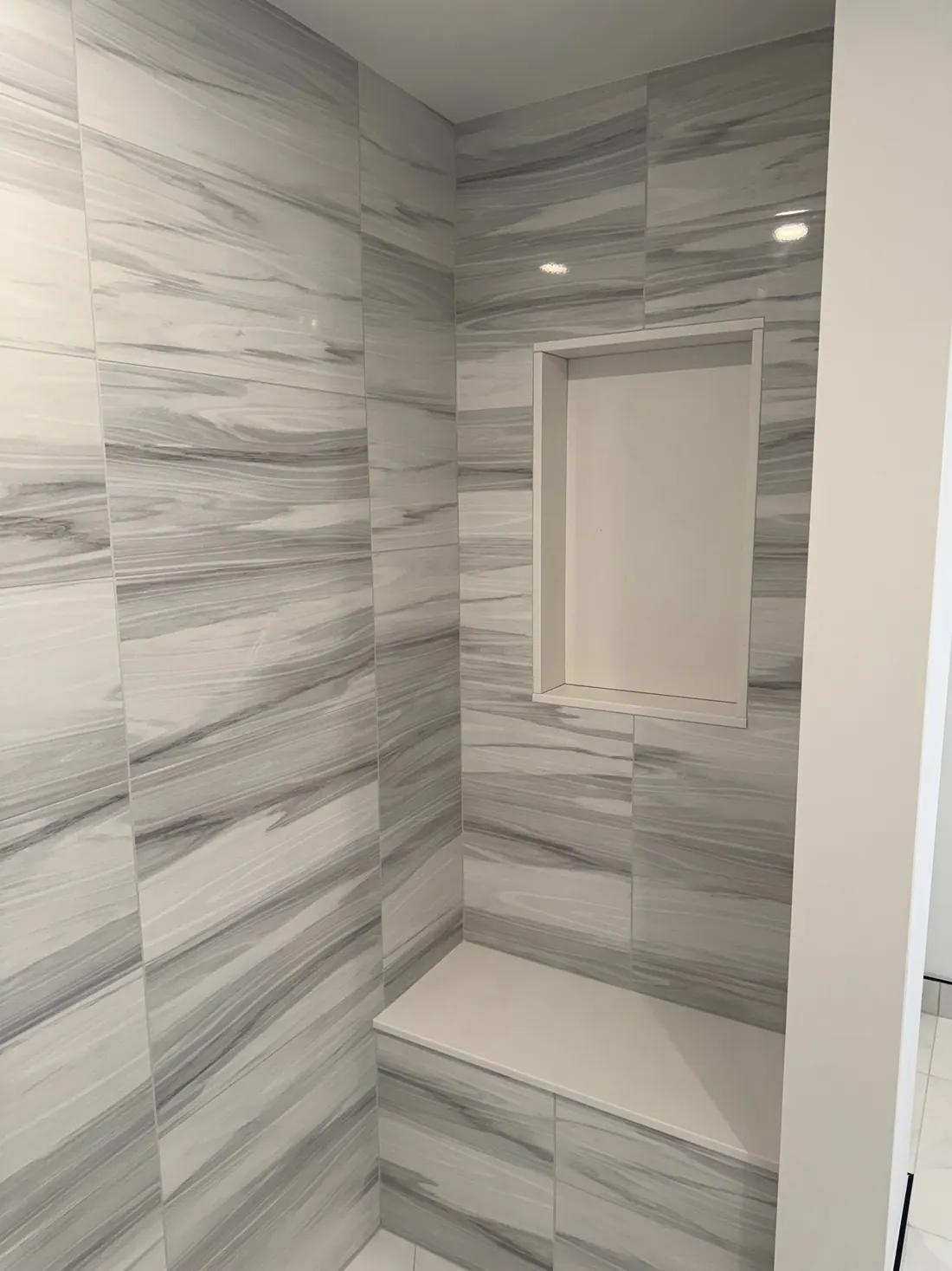 Shower bench and niche, side view