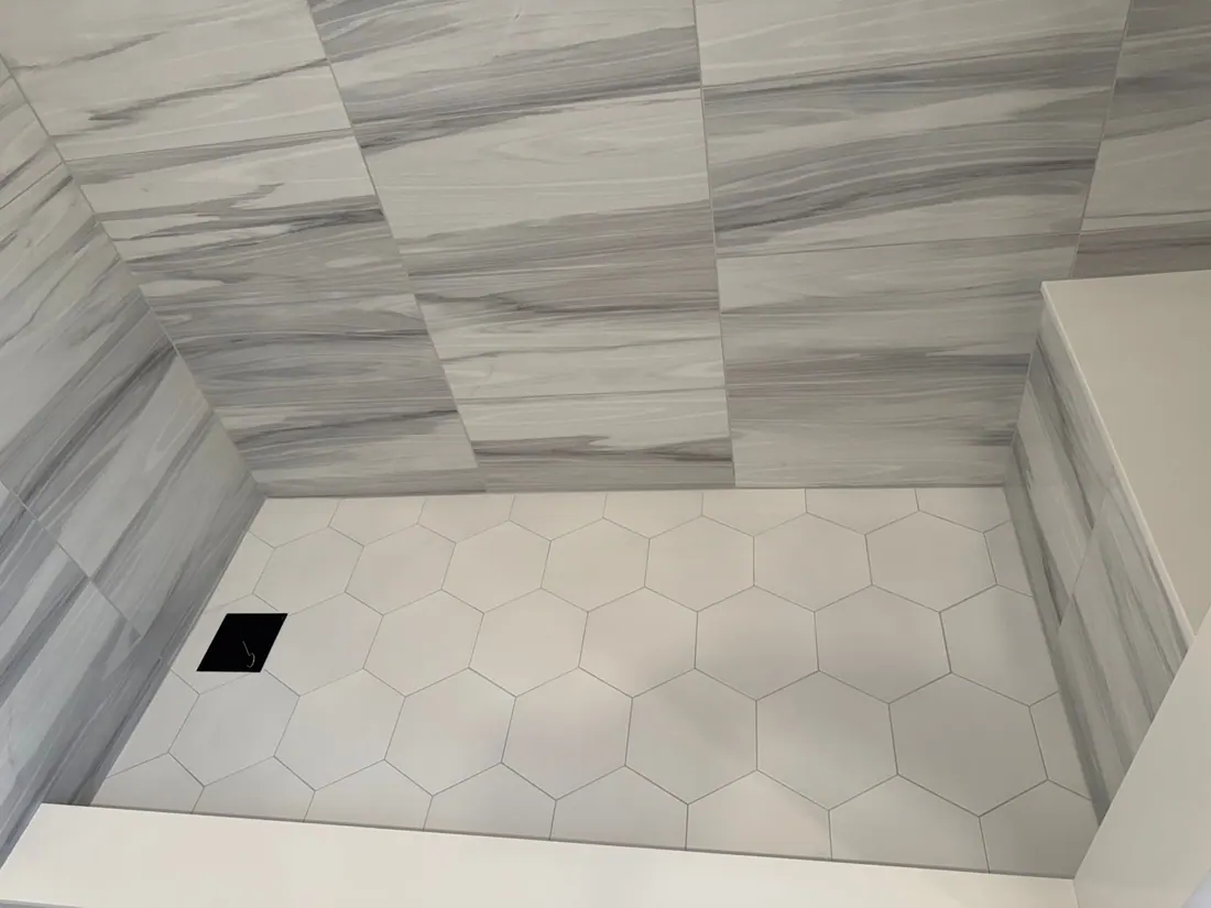 White hexagon tile shower floor