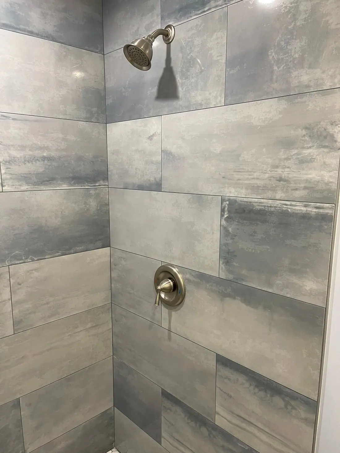 Large-format shower tile